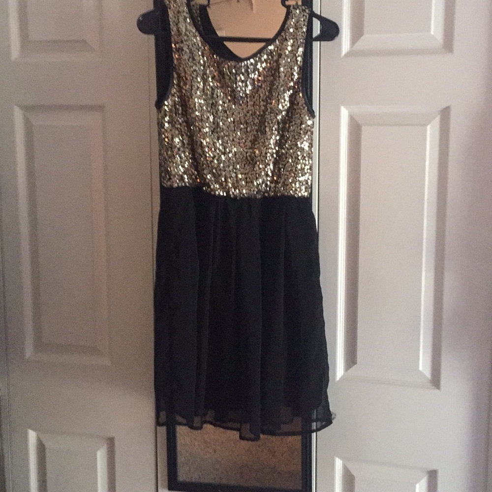 Dress worn twice.